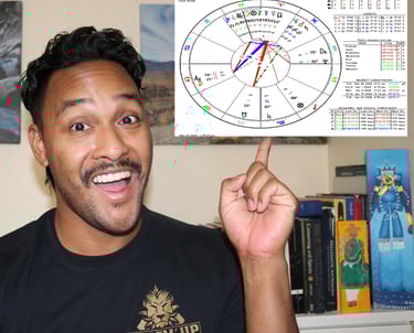 Wil in astrology reading room with astrology chart in corner