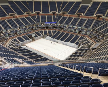 a large empty stadium with empty seats and empty seats