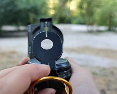 a person holding a compass
