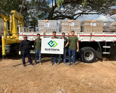 a group of men standing in front of a truck
