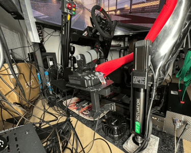 https://www.reddit.com/r/simracing/comments/19bgpz0/cable_management_nightmare_bi_polar_sim_build/