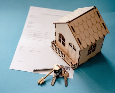 a house with keys and keys in front of a house