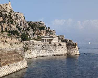 Corfu Greece St. Georges Church on rocky sea wall