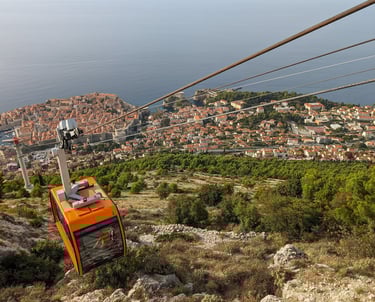 Dubrovnik Croatia cable car overlooking old city walls with ocean in distance