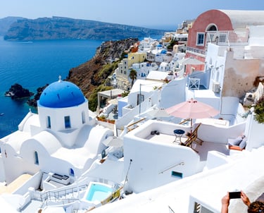 Santorini coastline from high above houses looking at water