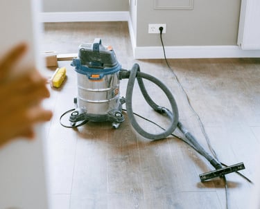 Professional post-construction cleaning service for dust and debris removal in a new home