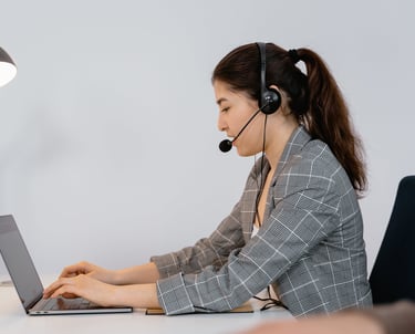 a woman in a headset with a headset and a microphone