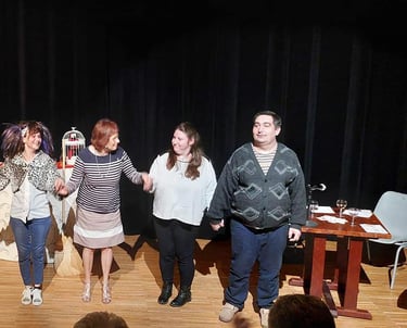 a group of people standing on a stage