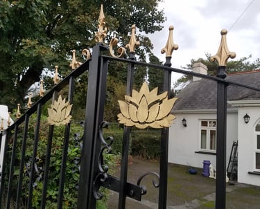 Golden spear top gates with floral detail