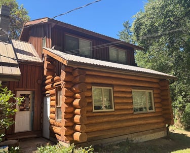 Log home in Courtenay after restoration by Embassy Restorations Vancouver Island