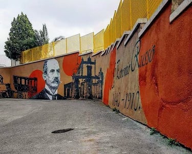 Mural dedicated to Italian historical figures, urban art created by Poliops with warm tones and arch