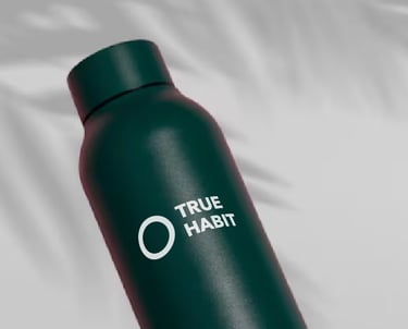 a bottle of Truehabit in a green bottle