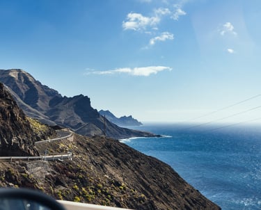 Grand Canary mountains with winding road overlooking water