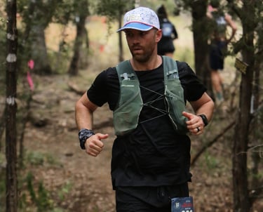 a photo of world class athlete derek pirtle racing the Austin Rattler 50K Ultra Marathon in Texas
