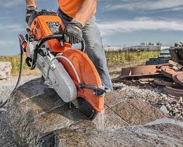  Using a cut off machine to cut stone