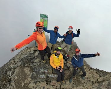 team on the main summit of Imbabura volcano