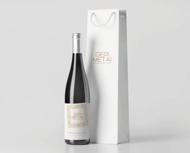 clear rowan wine label on a dark bottle and a gift bag with a logo
