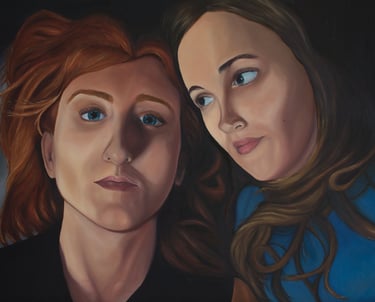 oil painting of two women's faces'