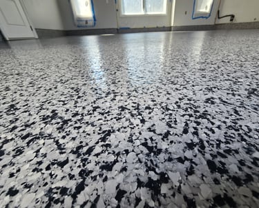 Black and white decorative flake garage floor coating with durable seamless finish