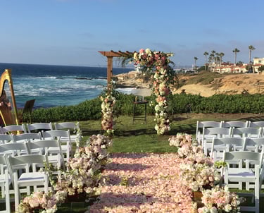 wedding florals at Cuvier park, the wedding bowl, la jolla with pink rose petal aisle
