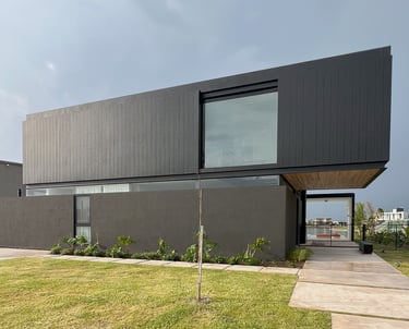 a house with a black and white exterior