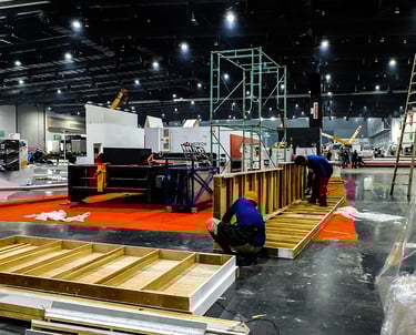 Staff working on setting up event production 