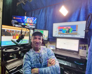 Eric DeRise, a dynamic Instructional Designer and Video Producer working in his studio.