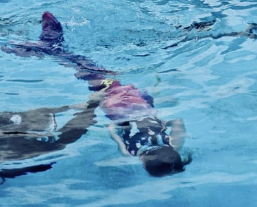 Mermaid learning to swim