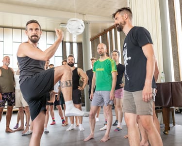 men learning a movement workshop