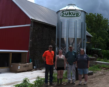 The Worthington Family with the Sukup grain bin