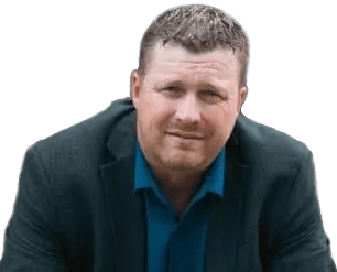Ronald Bowden, Mortgage Agent Level 1 at MortgageWell, in a dark blue blazer and blue shirt, relaxed