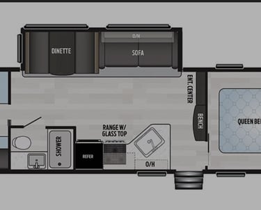 a floor plan of a travel trailer with a living room and kitchen