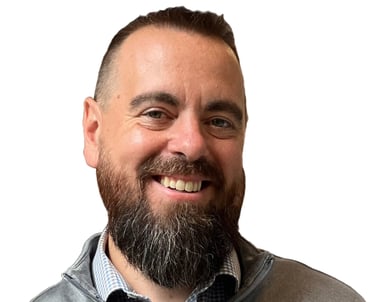 Kevin Gillis, principal mortgage broker and owner at MortgageWell Cornwall, wearing a grey pullover 