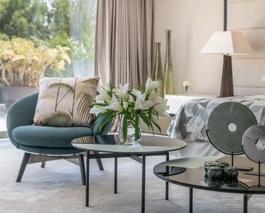 Contemporary designer suite at Villa Serenity, featuring clean lines and a soft, neutral palette