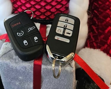 Two new Honda key fobs representing cheap locksmith Jack’s Locksmith local to WNC
