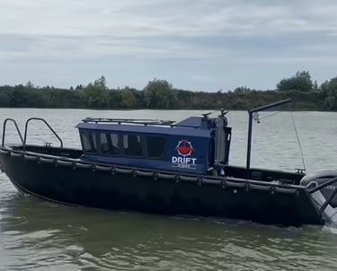 a boat with a blue and white boat in the water