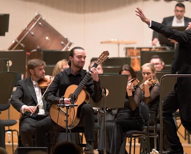 Classical guitarist Filip Babic playing with an orchestra