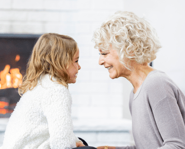 Grandmother and child are spending time together after holistic support for cancer side effects