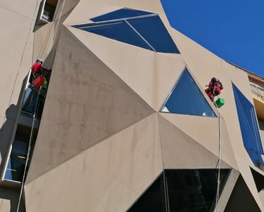 a person on a rope with a person on a rope