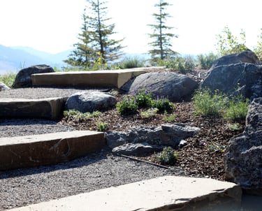 a stone steps leading up to a stone stepstone