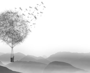 Dandelion hot air ballon over mountainscape
