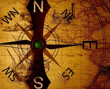 A vintage map with a compass overlay, showing cardinal directions, and faint drawings of transport