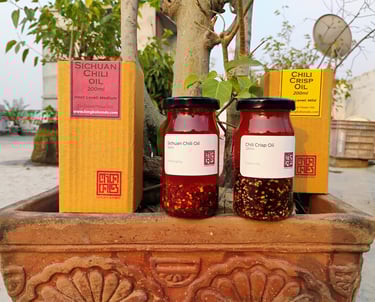 two jars of chili Oils and Two boxs of chili oils from Longka kando