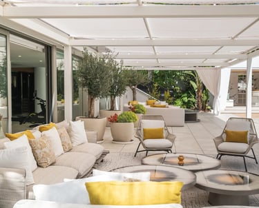 Pool area at Villa Serenity featuring modern furnishings, sunbathing lounges, and chill-out areas