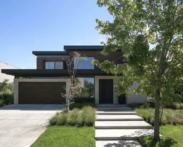 a house with a driveway and steps leading up to a driveway