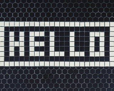 a black and white tile with a white and black checkered pattern