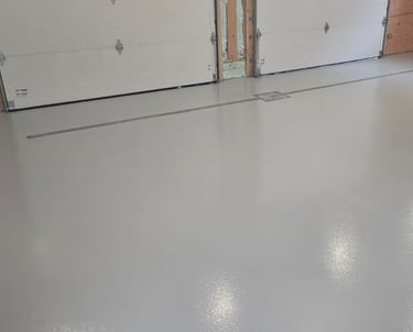 Solid colour epoxy floor with anti-slip oxide rolled in with a uv-stable satin urethane topcoat