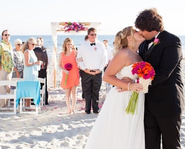 Bride & Groom kissing after wedding at South Beach, Coronado