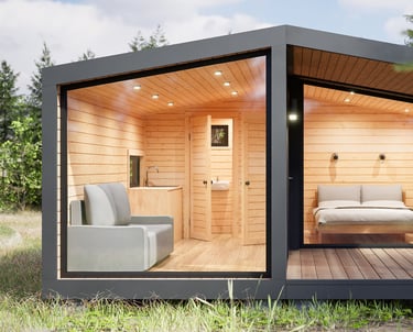 a small cabin with a bed and a couch