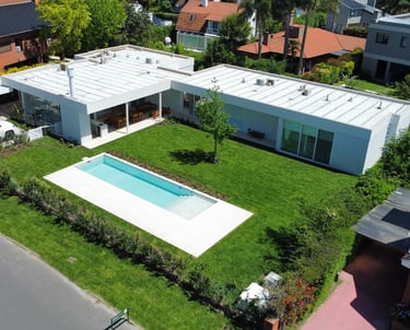 a house with a pool and a swimming pool